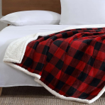 The Eddie Bauer throw blanket that 'feels like it hugs you' is on sale for $15