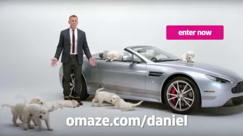 <h6><u>Win an Aston Martin Vantage GT Roadster from Daniel Craig and a bunch of puppies</u></h6>