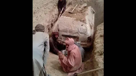 <h6><u>Taliban founder's Toyota Corolla dug up after spending 21 years buried</u></h6>
