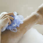 So, is it better to wash with a loofah or a washcloth? Here's the expert-approved answer