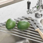 No counter space? This brilliant $9 drying rack fits in the corner of your sink