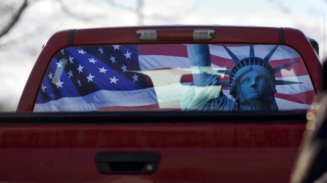 Pickup truck with flag rear window