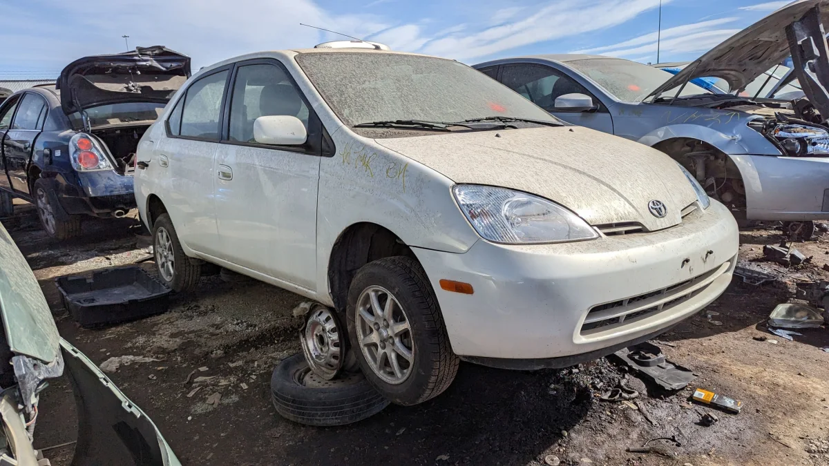 24 - 2003 Toyota Prius sedan in Colorado junkyard - photo by Murilee Martin